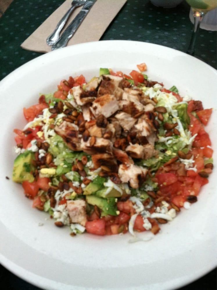Chopped Salad · Grilled chicken breast, mixed lettuces, tomato, bacon, avocado, bleu cheese, hard boiled egg and spicy pepitas tossed in a tangy vinaigrette.