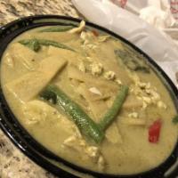 Green Curry · Traditional green curry with coconut milk, bamboo shoots, and green beans. Little bit spicy.