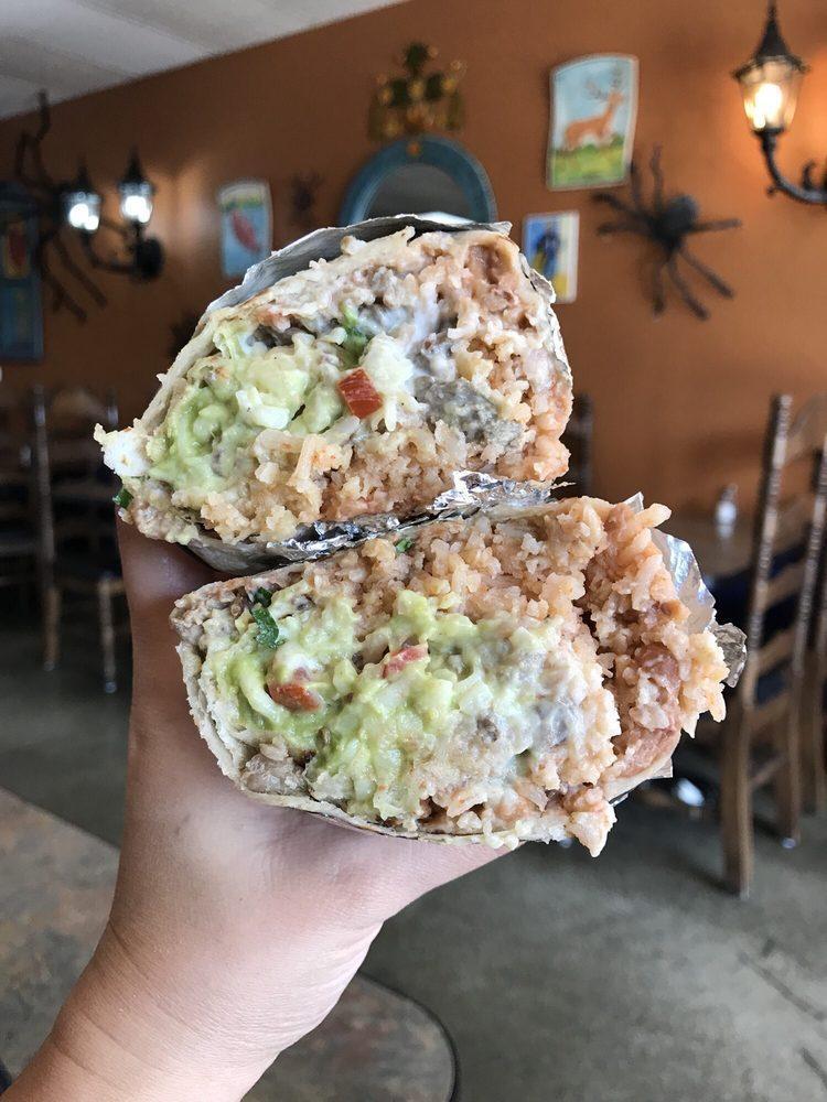 Super Burrito · Refried beans, Rice, choice of meat, sour cream, cheese, guacamole, onions and cilantro