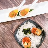 Miyabi Oyster · Two pieces of fresh oysters with sea urchin, salmon roe, and fish caviar served with Tosazu ...