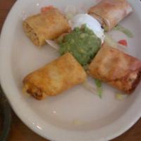 Taquitos · Flour tortilla filled with cheese and choice of chicken, picadillo or veggie. Lightly fried ...