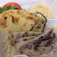 Chicken Kebabs Plate · Two herb grilled chicken skewers served with tossed salad, rice, pita, and homemade yogurt s...