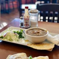 Pozole · Our traditional Mexican pork stew with hominy and a red chile sauce, fresh garnishes such as...