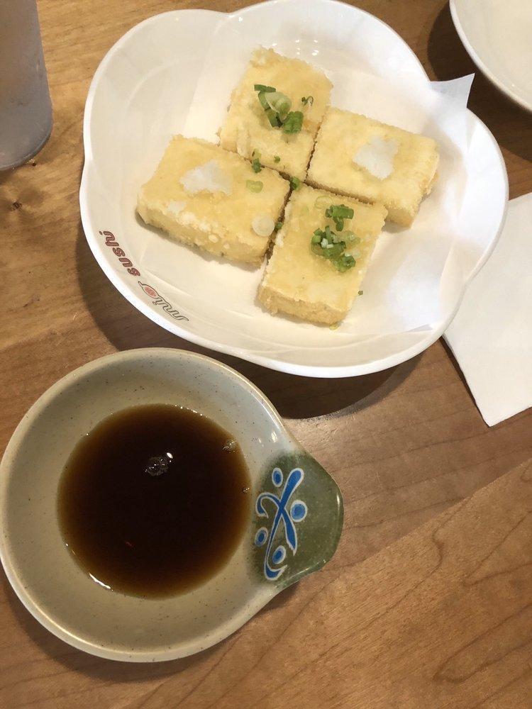 Agedashi Tofu · Vegetarian. 4 pieces deep-fried tofu, bonito flakes, green onion, radish and tempura sauce.