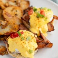 Eggs Benedict · 2 poached eggs on a toasted English muffin, hollandaise sauce and choice of one of the follo...