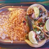 Street Tacos · 3 pieces. 4” double corn tortilla topped with your choice of chicken, carnitas, carne asada ...