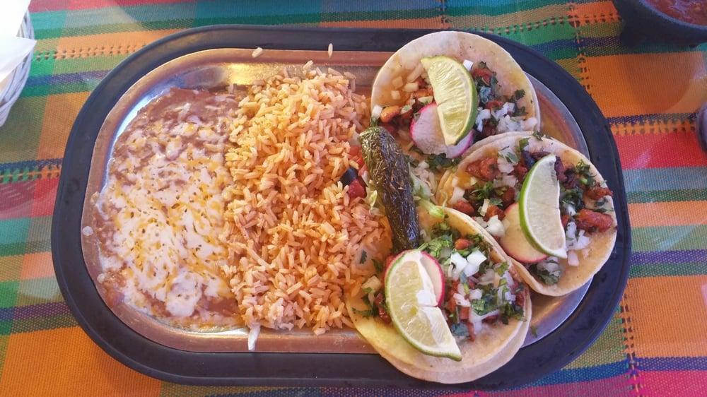 Street Tacos · 3 pieces. 4” double corn tortilla topped with your choice of chicken, carnitas, carne asada or al pastor, onions, and cilantro.