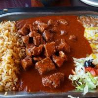 Chile Colorado · Chinks of beef in red sauce.