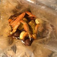 Treasure Chest · 1/2 lb. shrimp (head off), 1 cluster snow crab legs, 1/2 dozen Andouille sausages, 2 eggs, 2...