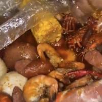 Master of The Sea · 1 lb. crawfish, 1 lb. shrimp (head off), 1 cluster snow crab legs, dozen Andouille sausages,...