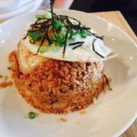 Kimchi Fried Rice · Fried rice wok fried with beef bulgogi, kimchi, sweet soy, topped with a fried egg, green on...