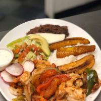 Camarones Rancheros Platilos · Shrimp slices with green pepper, onions, and tomato. Served with rice, beans, salad avocado,...
