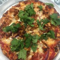 BBQ Chicken Pizza · Grilled chicken breast, red onions, cilantro,our BBQ, and tomato sauce.