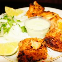 Chicken Behari Boti · Boneless chicken breast pieces marinated in ginger garlic paste, red chilis, onions and a cr...