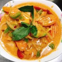 Red Curry · Red Curry paste with coconut milk, bamboo shoot, zucchini, bell peppers, fresh basil 
