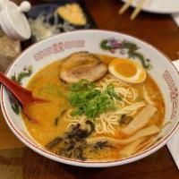 Spicy Miso Ramen · Spicy miso base. Tonkotsu pork broth noodles with spicy miso dashi, topped with pork belly c...