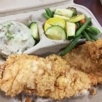 Country Fried Chicken · Fresh chicken breast house-battered, fried and topped with homemade country gravy. Served wi...