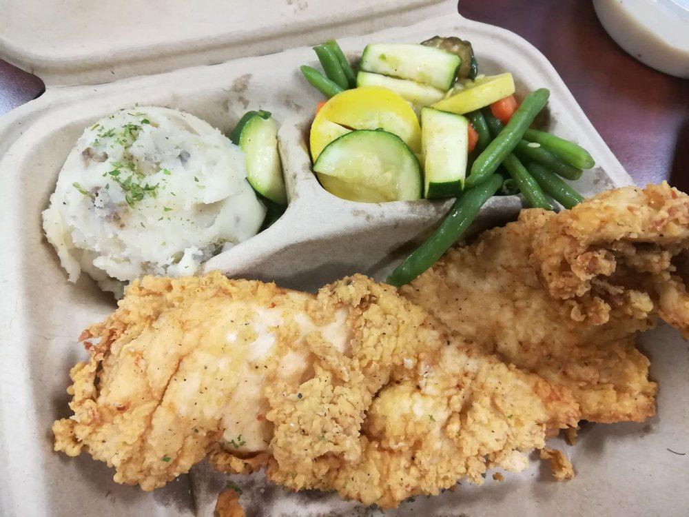 Country Fried Chicken · Fresh chicken breast house-battered, fried and topped with homemade country gravy. Served with mashed potatoes and veggie medley.