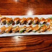 Dragon Roll · Shrimp tempura and cucumber topped with unagi, crab meat, avocado, tobiko and unagi sauce. C...