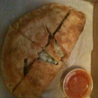 Steak and Cheese Calzone · Ricotta, Romano, Parmesan, cheddar, mozzarella, shaved steak, green peppers and onions. Sauc...