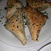 Spanakopita · Traditional spinach and feta pie.