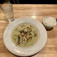 Green Curry · Coconut milk with green chili paste, eggplant, bamboo shoot, bell pepper, green bean, basil.