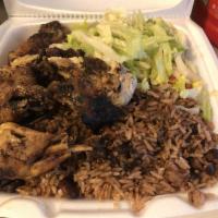 Jerk Chicken · Served with roti, white rice, pea and rice, vegetable rice or boiled provision with steamed ...