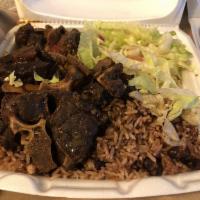 Oxtail · Served with roti, white rice, pea and rice, vegetable rice or boiled provision with steamed ...