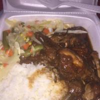 Stew Chicken · Served with roti, white rice, pea and rice, vegetable rice or boiled provision with steamed ...