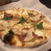Pera Pizza · Olive oil base, garlic, five cheeses, red onion, sliced pears, prosciutto, pistachios and ba...