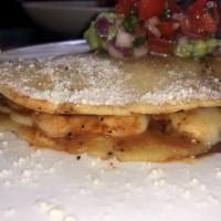 Shrimp Quesadilla · Shrimp. Corn or flour tortilla, chihuahua cheese, sour cream, and topped with pico de gallo ...