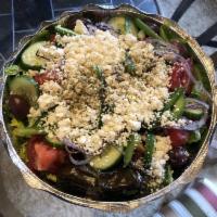 Greek Salad · Romaine lettuce, cucumber, tomato, red onions, olives and feta with extra virgin olive oil, ...