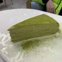 Matcha Crepe Roll · matcha crepe wrapped with match sauce, whipped cream and red beans
