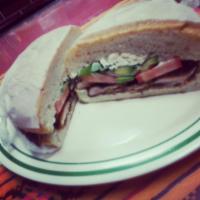 Cemita · Served with your choice of meat.