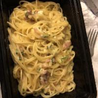 Spaghetti Carbonara · Pancetta, eggs, cream sauce, black pepper and Parmigiano.