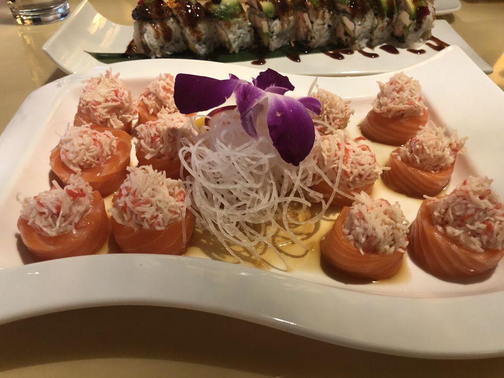 Butterfly Kiss Roll · Special crab meat, wrapped in salmon with ponzu sauce (no rice).