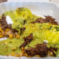 Short Rib Benedict · 2 corn cakes topped with short rib braised barbacoa over Mexican street cream corn, poached ...