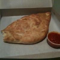 Calzone · With sauce and 1 topping.