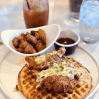 Chicken and Waffles · Organic crispy chicken, jalapeno, cheddar cheese, bacon waffles, 100% maple syrup, grove pot...