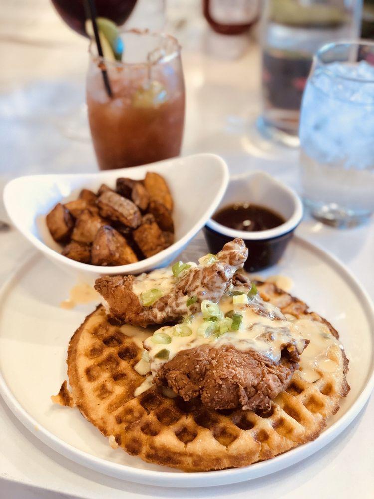 Chicken and Waffles · Organic crispy chicken, jalapeno, cheddar cheese, bacon waffles, 100% maple syrup, grove potatoes.
