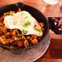 Egg and Hash Skillet · Diced pork belly, diced sweet potato, onion, red and green peppers, olives and 2 eggs.