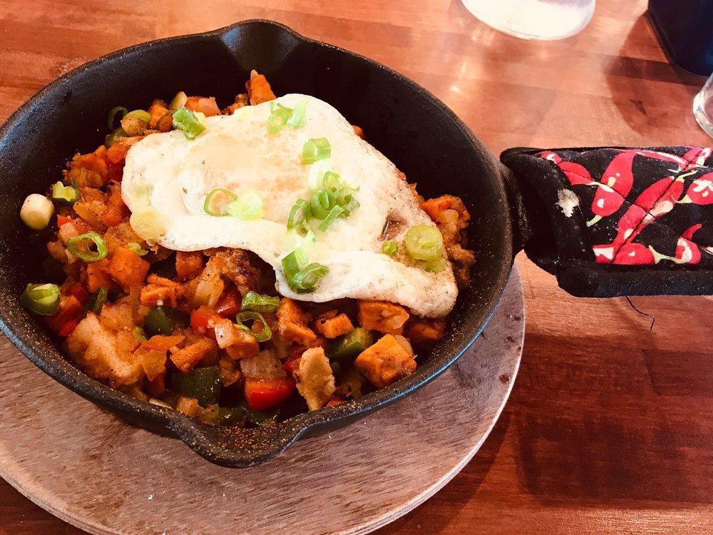 Egg and Hash Skillet · Diced pork belly, diced sweet potato, onion, red and green peppers, olives and 2 eggs.