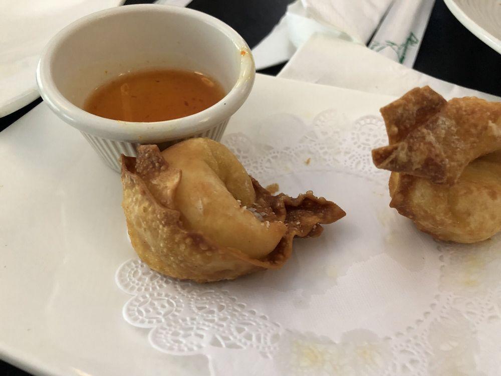 Crab Rangoon · Deep-fried wonton field with cream cheese, celery, and crabmeat.