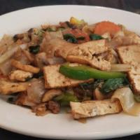 Pad Kee Mao · Stir-fried with rice noodles and assorted vegetables and fresh basil, bell pepper, and jalap...
