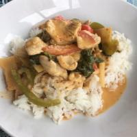 Red Curry · Special Thai red curry paste, bamboo, basil, bell pepper. Served with jasmine rice.