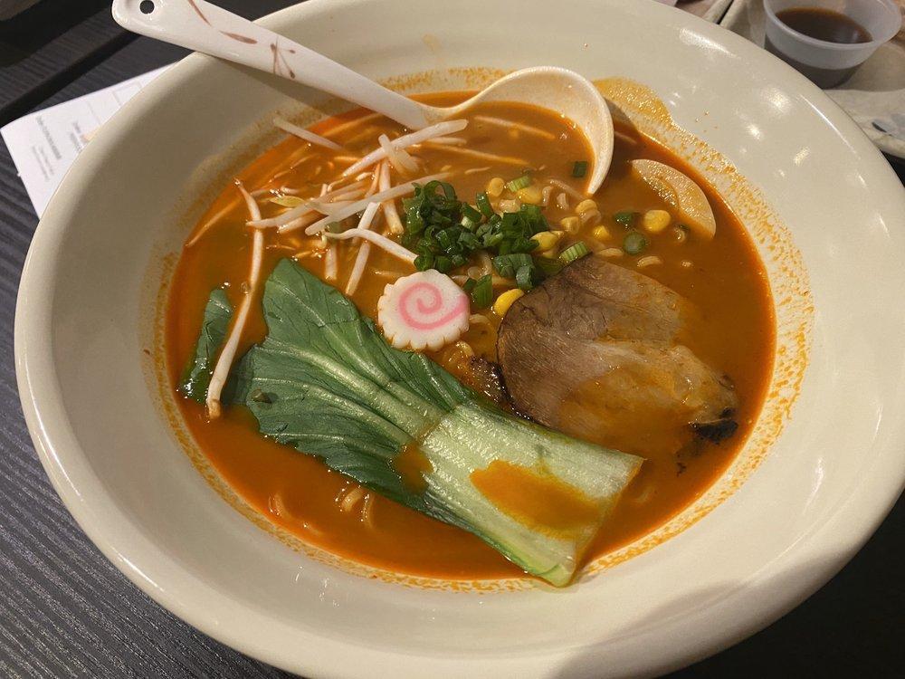 Spicy Miso Ramen · Yellow egg noodles, chashu (roasted pork belly), seasoned egg, bok choy, naruto (fish cake), bean sprouts, green onion, corn. Spicy.