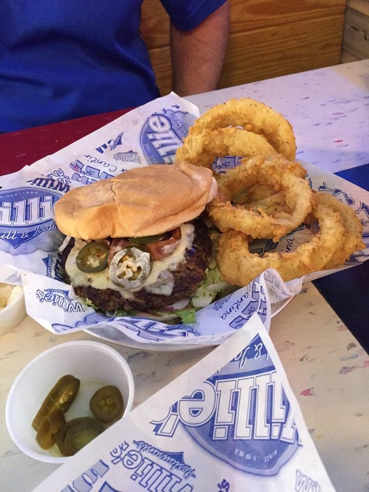 Willie Burger · Half pound certified Angus beef patty, cooked medium well topped with mayo, mustard, lettuce, tomatoes, pickles, onions, and served with choice of side.