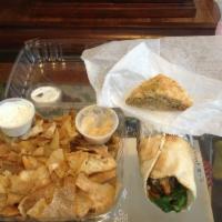 Pita Chips · Homemade from sliced Syrian bread, lightly fried, and topped with organic spices. Served wit...