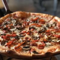 Piaggio Pizza · Pepperoni, sausage, black olives, mushrooms, roasted red pepper, mozzarella, Parmesan and to...