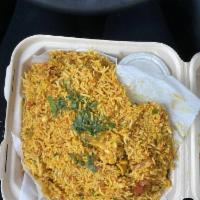 Vegetable Biryani · Assortment of vegetables mixed with saffron flavored basmati rice.